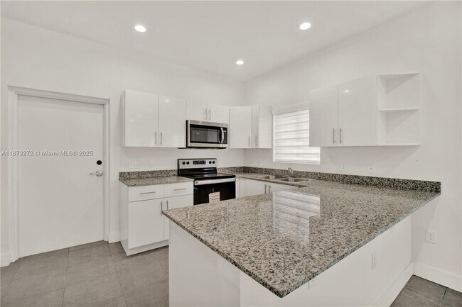 Building Photo - 6331 NW 1st Pl