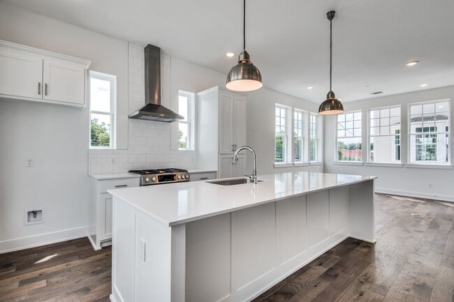 Building Photo - Welcome to a beautiful Craftsman-style Tow...