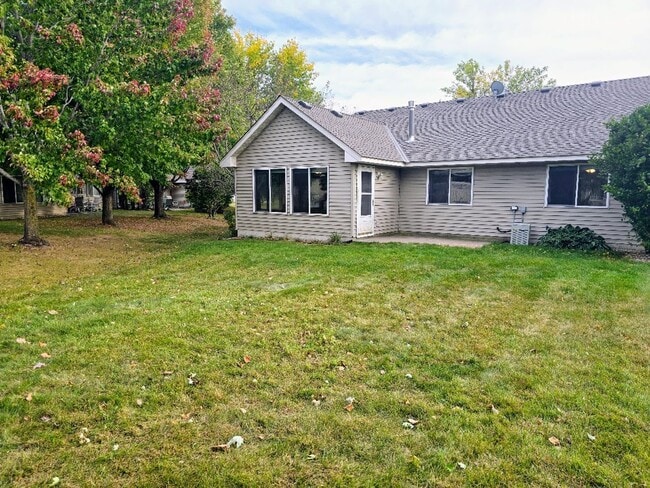 Building Photo - Charming 2-Bedroom, 2-Bathroom Home with Sunroom & Patio in Woodbury, MN