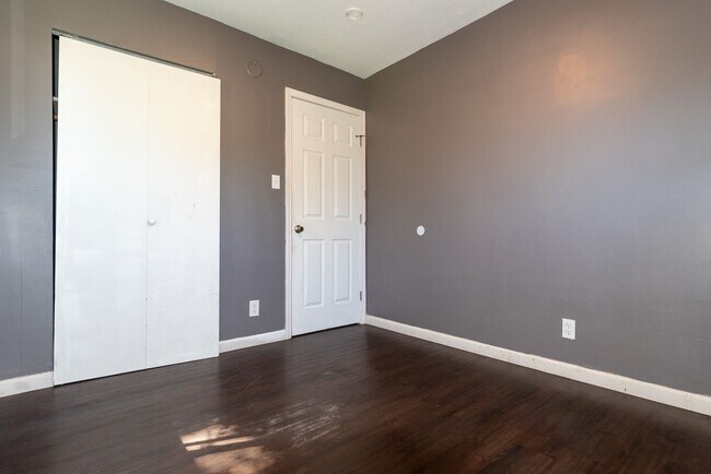 Building Photo - This charming 5-bedroom, 2-bathroom home is available for $2,000/month.