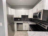 Building Photo - $500 Off 1st Month Rent- Renovated 2BR | Granite Kitchen | In-Unit Laundry