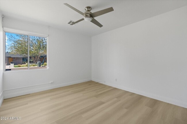 Building Photo - 1455 E Tuckey Ln