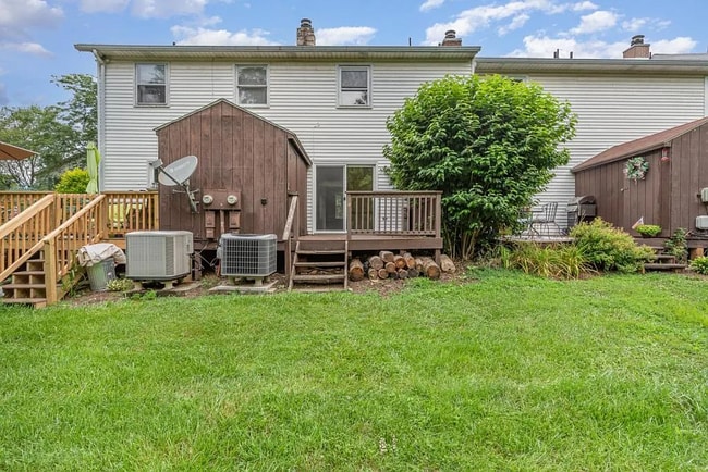 Building Photo - This charming house offers a cozy and comfortable living space.