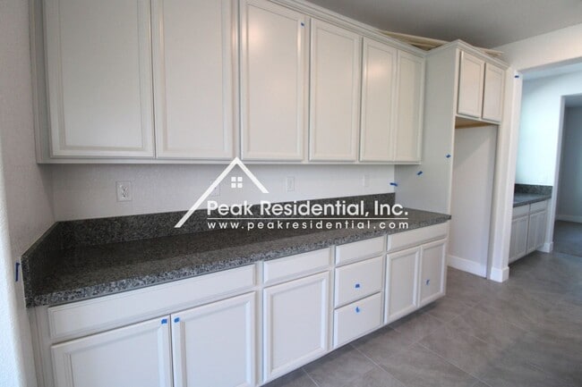 Building Photo - 4 br, 3 bath House - 8200 Triplefin Way