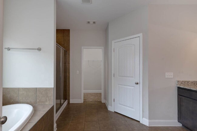 Building Photo - 4BR/3.5BA · 2,809 SF · Owner's Suite on Main · Fenced Yard · Midland, GA — $2,800/mo
