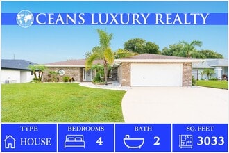 Building Photo - Executive Coastal Retreat | Four-Bedroom P...