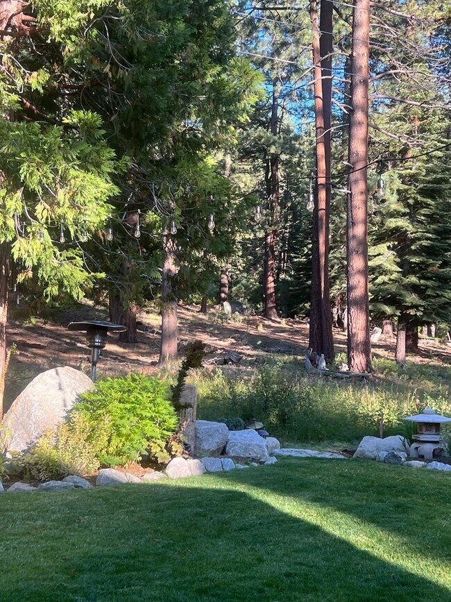 Building Photo - Upscale Chalet with 2 Car Garage Backing t...