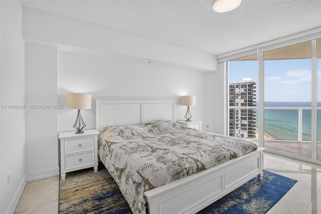Building Photo - 16699 Collins Ave