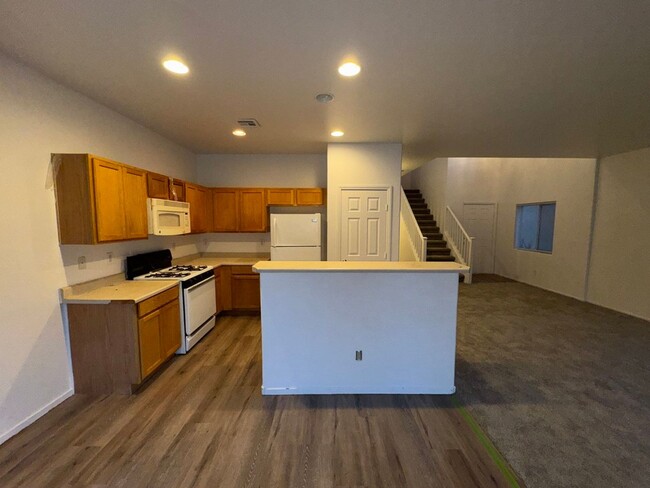Building Photo - Fresh Paint/New Flooring all inside! Four ...