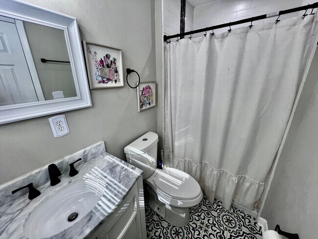 Building Photo - Come see this FULLY renovated two-story tr...