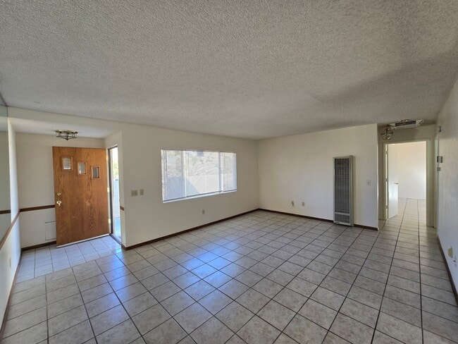 Building Photo - 1/2 Acre and All Tile!