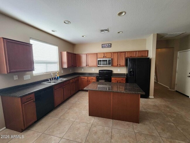 Building Photo - 7643 W Charter Oak Rd