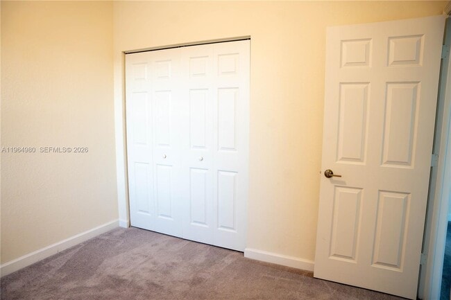 Building Photo - 11091 W 32nd Ln