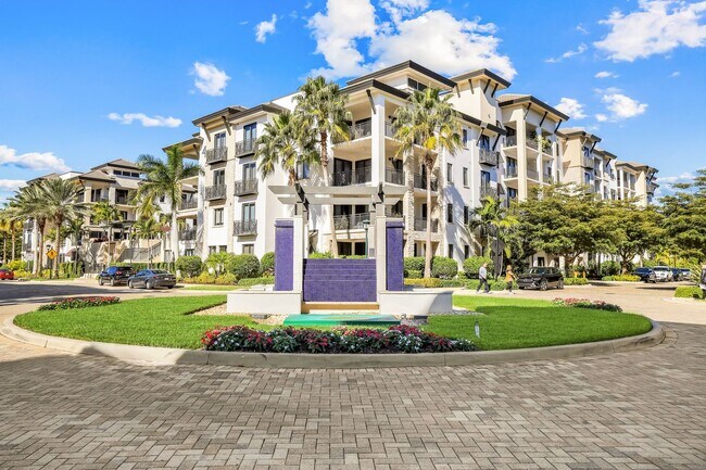 Building Photo - Luxury Living Meets Prime Location! Naples Square 2/2 Condo with Expansive Terrace
