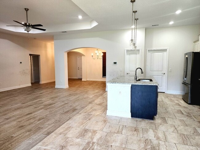 Building Photo - Welcome to this stunning 4-bedroom, 3-bath...