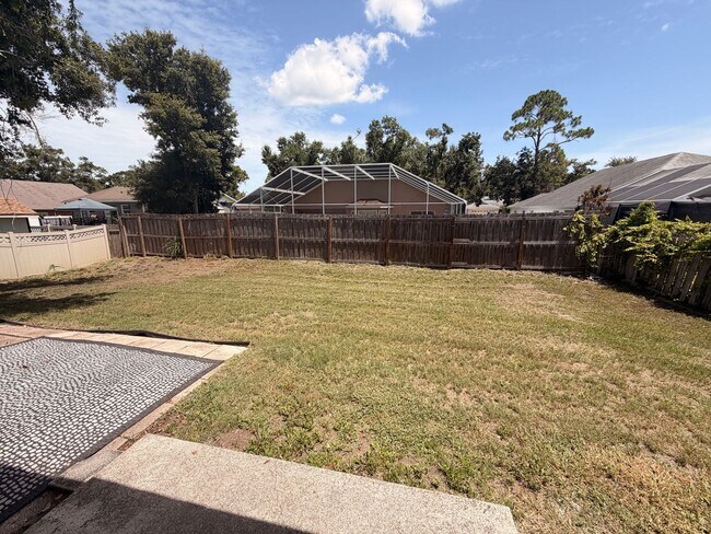 Building Photo - 2/2 Bedroom house with 1 car garage and fenced yard.