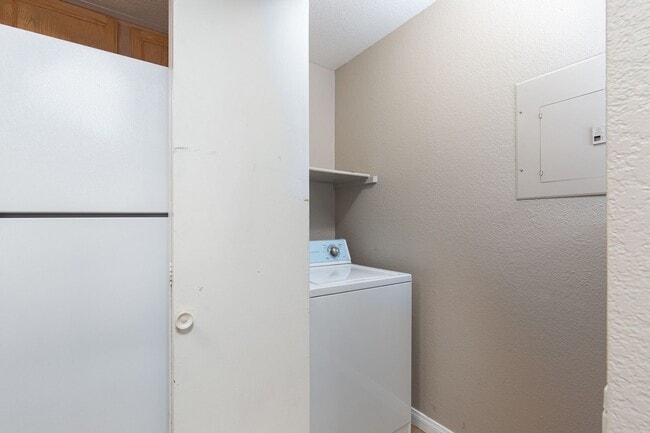 Building Photo - Remodeled first floor unit in gated commun...