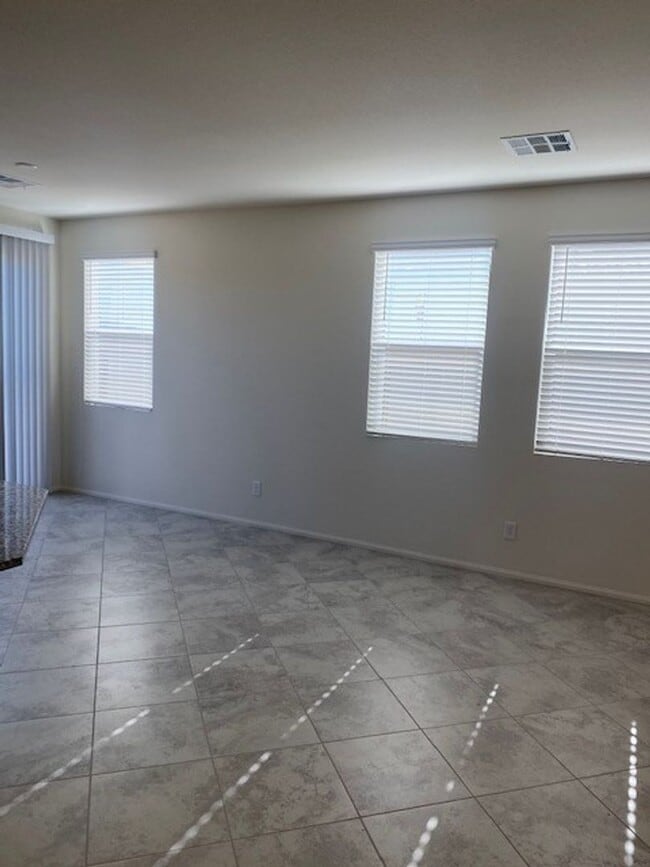 Building Photo - Beautiful Townhome in a Gated Community with 2-Car Garage!!