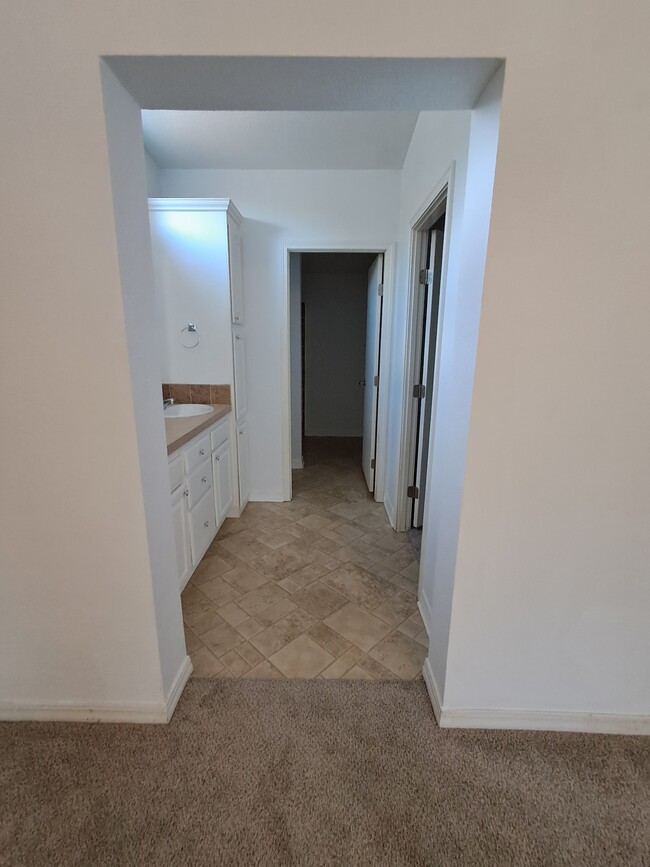 Master bath with split toilet area from sinks - 403 Quail Hollow Rd