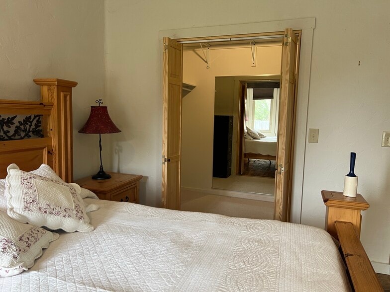 Bedroom with large walk in closet. Lots of storage - 3575 N Brookside Ln