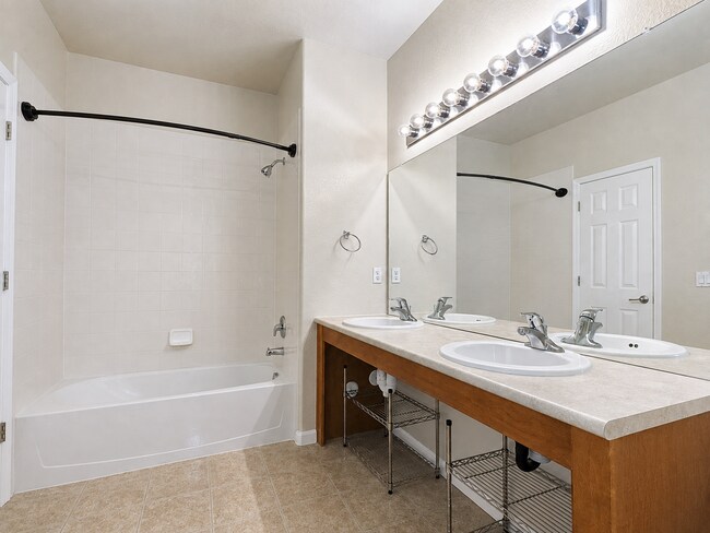 Building Photo - Spacious 2-Bedroom Condo with Garage, Fireplace, Pool & Most Included Utilities