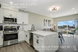 Building Photo - $1,000 Move-in Credit! The Carl on Lauretta