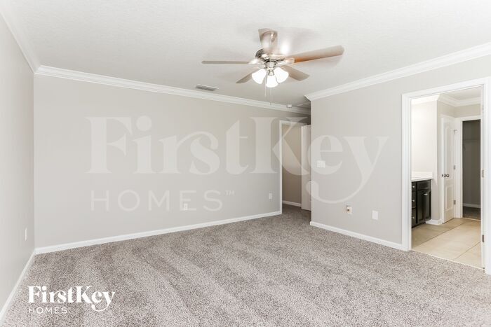 Building Photo - 9019 Devon Pines Dr