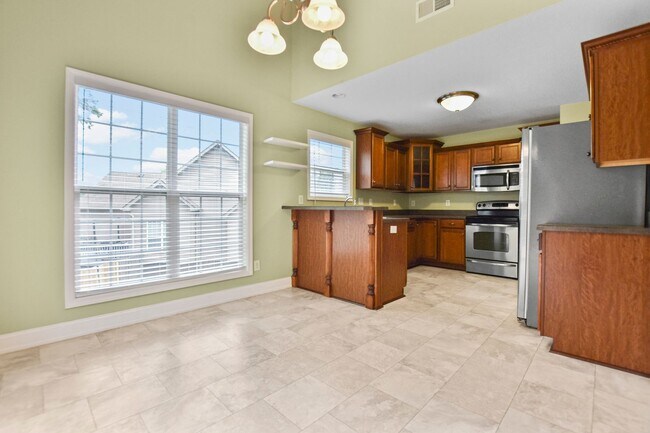 Building Photo - Dog Friendly Three Bedroom with Bonus!