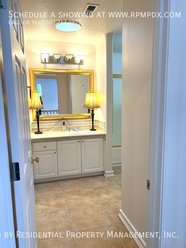 Building Photo - 6463 NW Wenmarie Dr