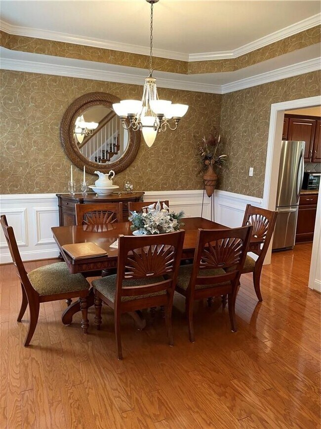 Building Photo - Updated four bedroom home First floor master, maintenance free with club house