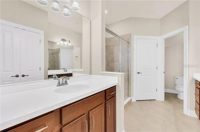 Primary Bedroom Bathroom (2 sinks) - 13334 Bovet Ave