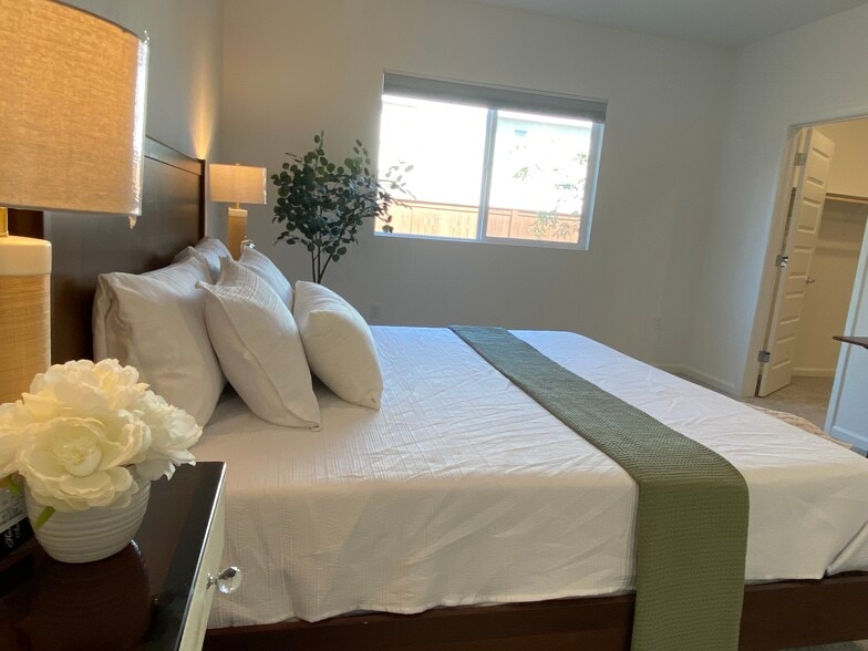 Owner's Suite Bedroom with Blackout Blind and optional queen bed and electric standing desk - 1683 Sandoval Dr