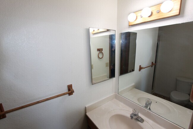 Building Photo - Bright 2BR Townhome in Boyington Heights | Private Balcony + Fenced Backyard