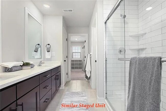 Building Photo - Stunning and Bright 3BR 2.5BA Townhome w/ 2-Car Garage • Quartzite Kitchen • Deck in Parkville