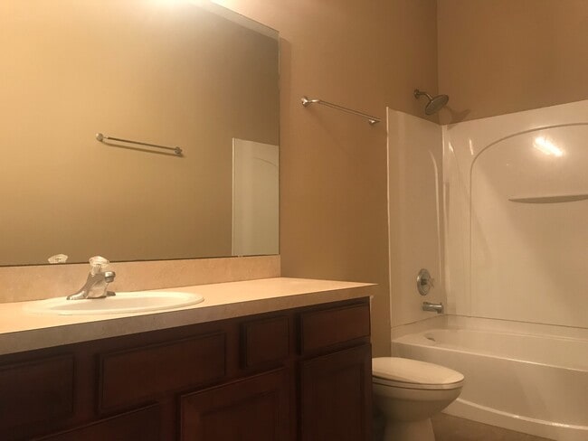 Building Photo - MOVE IN SPECIAL- Beautiful 3/2.5 Harmony Condo.
