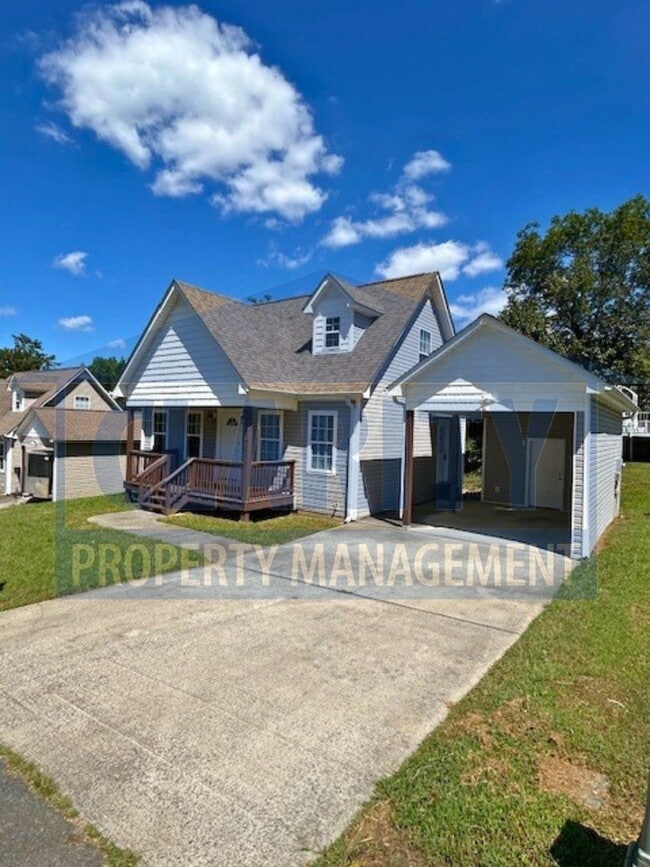 Primary Photo - Charming three-bedroom home with carport!