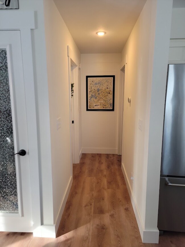 Pantry on left, and hallway to master bed, bath, and laundry - 2836 Sleepy Hollow Rd