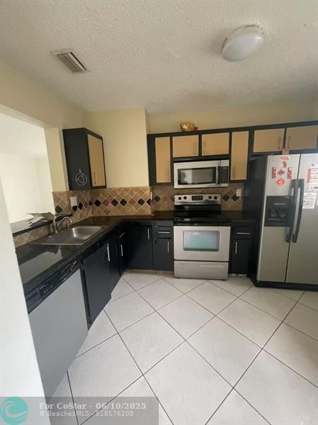 Building Photo - 12141 Royal Palm Blvd