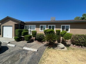 Building Photo - 4 bedroom 2 bath updated and new in Centra...