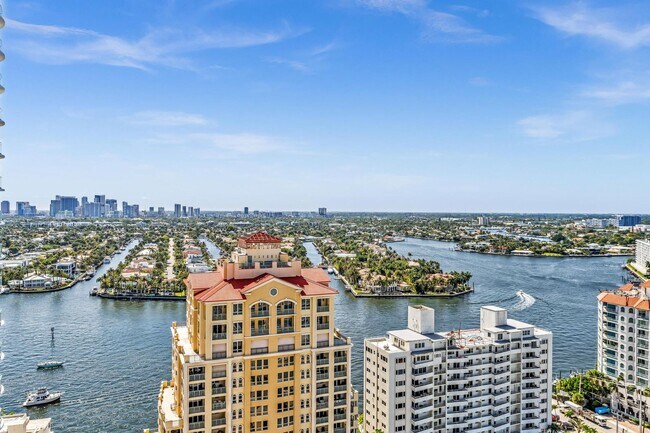 Building Photo - Stunning High-Rise Condo with Ocean Views | Prime Beach Location