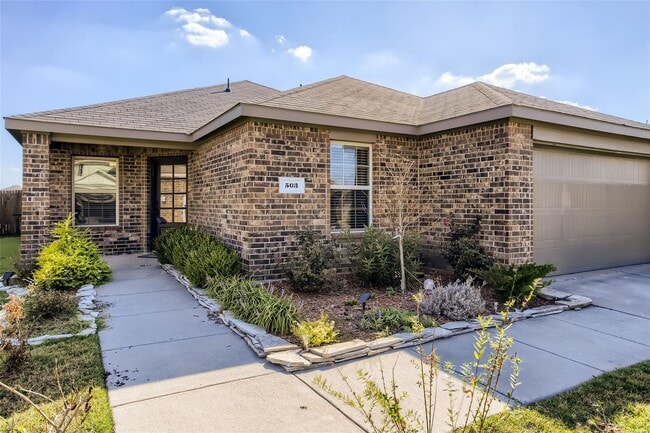 Building Photo - This well-maintained 4 bedroom home is located in a quiet neighborhood that has a community park ...