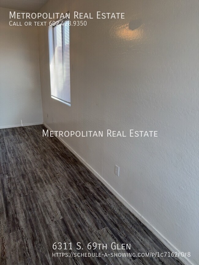 Building Photo - 6311 S 69th Glen