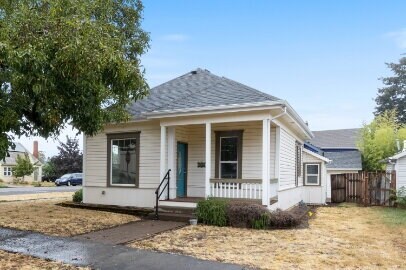Building Photo - Charming & Updated Home with Garage