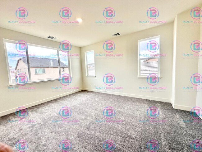 Building Photo - Modern Elegance: Stunning  New 4-Bedroom Home with Chef’s Kitchen & Dual Living Spaces