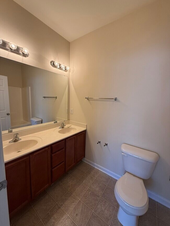 Building Photo - Spacious 2 Bed 2.5 Bath Town Home Available Now! Community Playground!