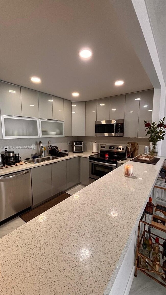 Building Photo - 19390 Collins Ave