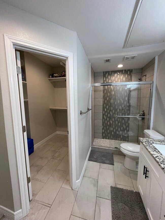Walk in closet off single bathroom - 5550 Spring Valley Rd