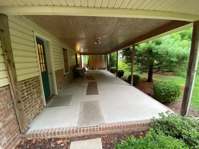 covered back porch - 104 E Poplar St