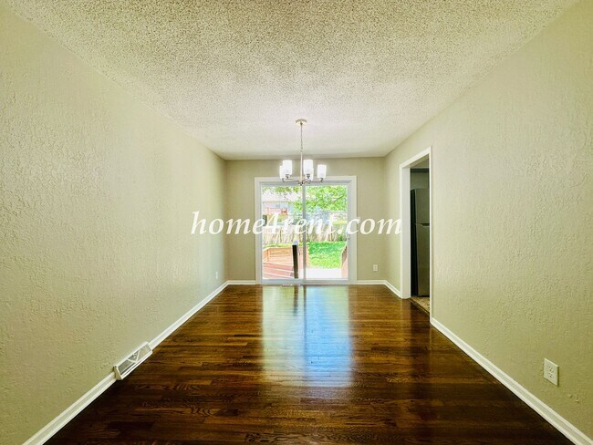 Building Photo - Updated Raytown Ranch w/ Wood Floors, SS Appliances, Finished Basement and a Fenced Yard!