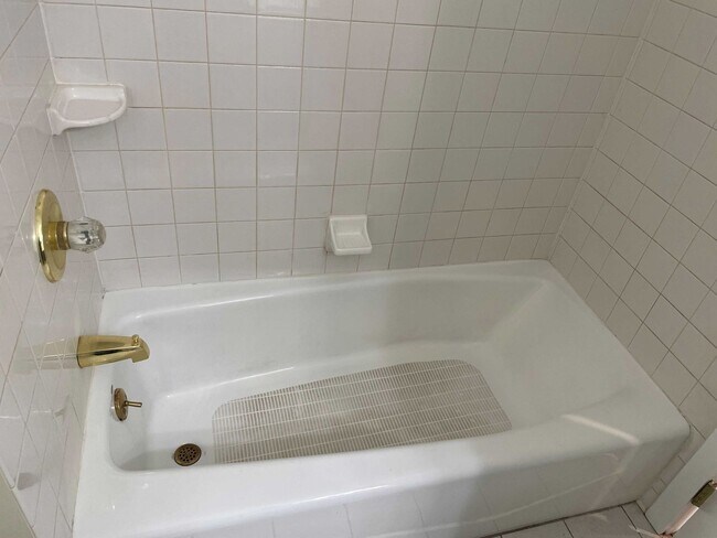 Building Photo - Spacious 3BR Townhome with Walkout Basement, Deck, Fenced Yard, Central A/C + Assigned Parking